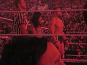 AJ Lee and Daniel Bryan wait during the commercial