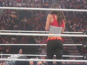 AJ Lee looks down on a defeated Zack Rider