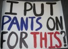 'I Put On Pants For This?' sign for WWE Raw