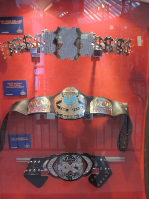 Million Dollar, WCW Tag Team, and NXT Woman's Championship Belts