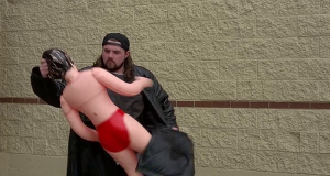Silent Bob pulls a blow up dollfrom his trenchcoat